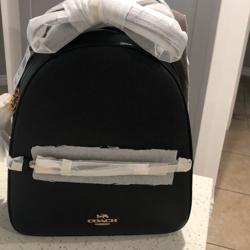 Coach Jordyn backpack with matching wallet